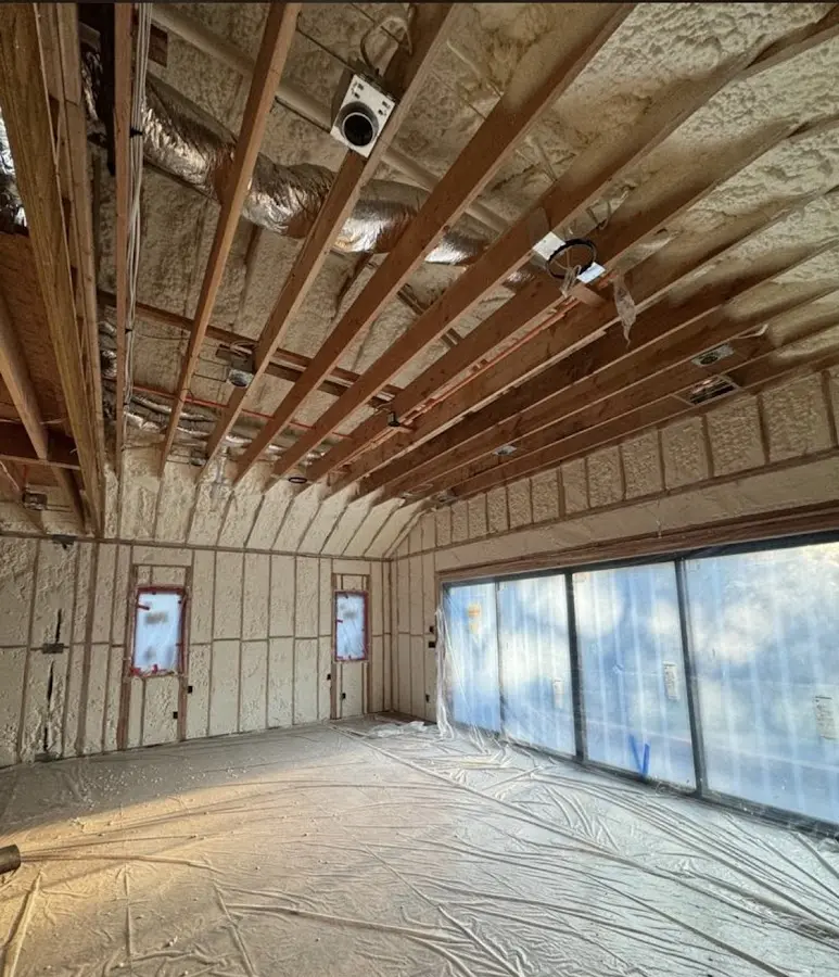 Interior walls and ceiling insulated with spray foam during new construction in High Springs